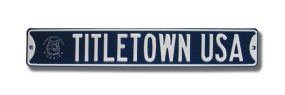 unknown TITLETOWN USA with Uconn logo Street Sign